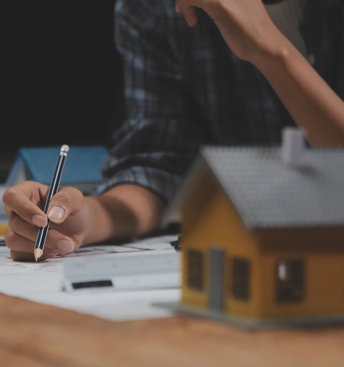 ADU permits Los Angeles CA architectural plans and documents being reviewed and signed for city approval process