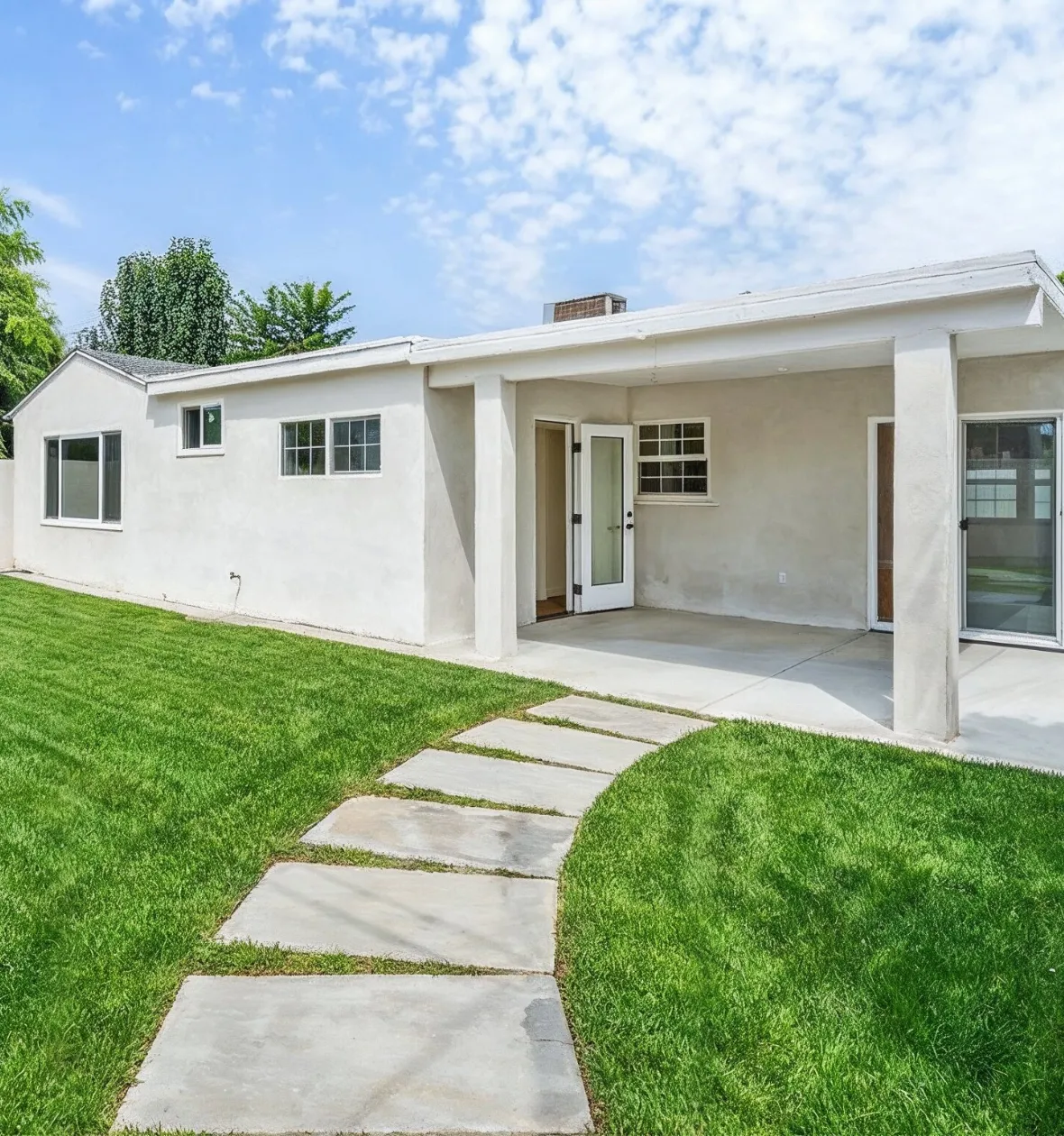Detached ADU construction Los Angeles CA modern backyard accessory dwelling unit with patio cover and private entrance