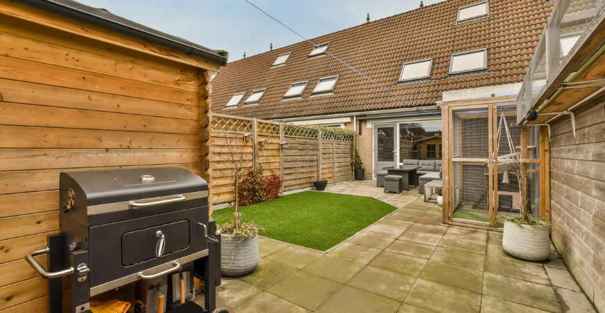 Residential backyard ADU patio with outdoor seating and garden – Best ADU LA